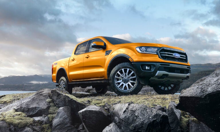 2023 Ford Ranger parked on rocks by the water