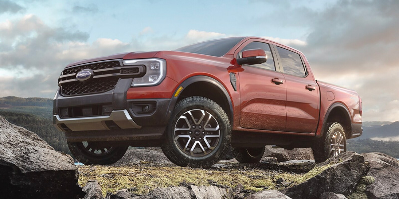 Orange Ford Ranger Atop Mountain
