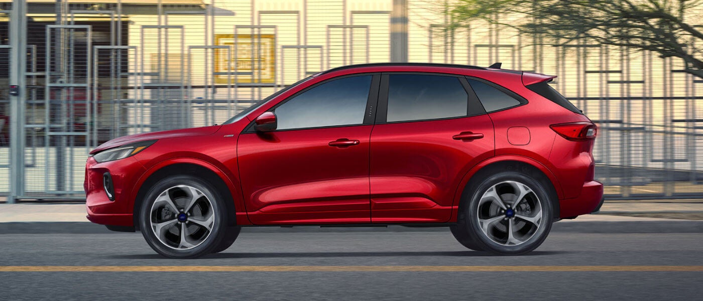 2026 Ford Escape side view by modern building